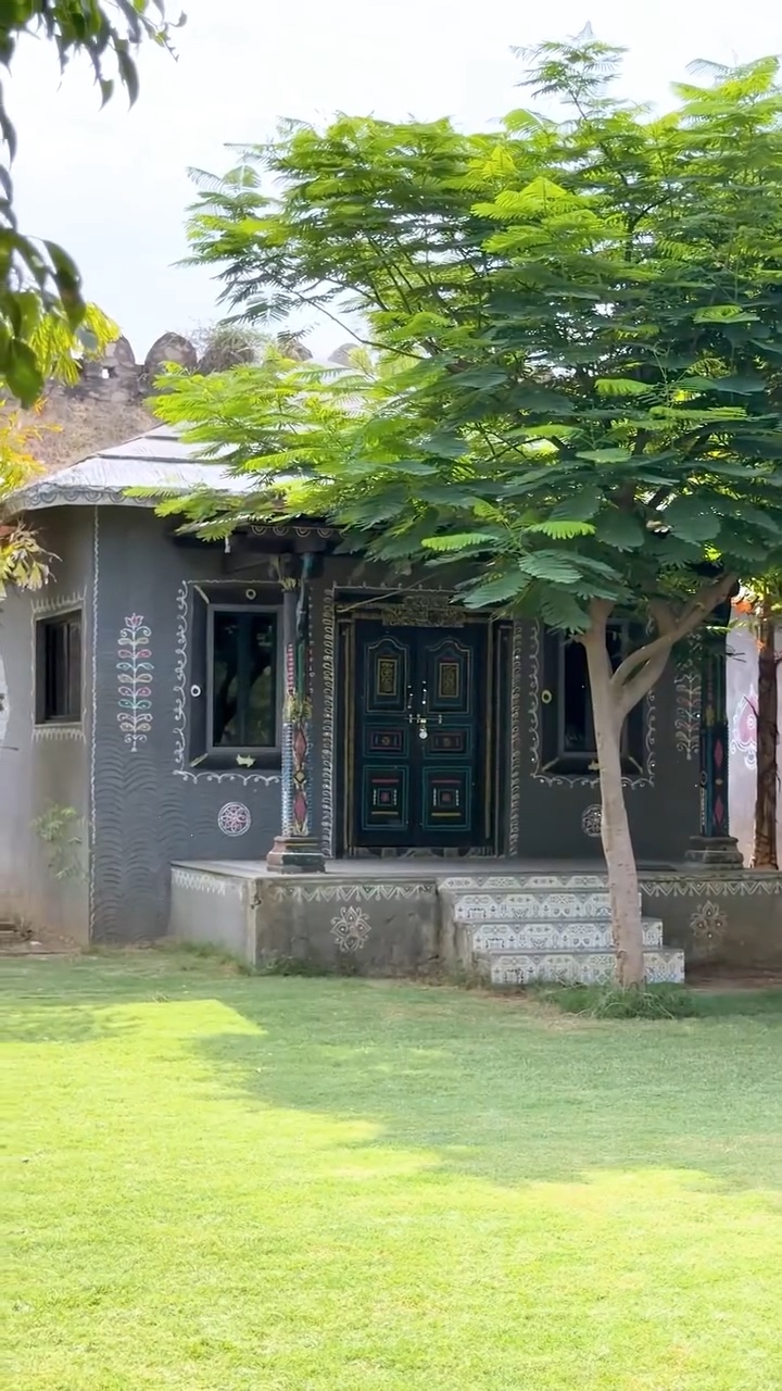 Painted cottage on the lawn